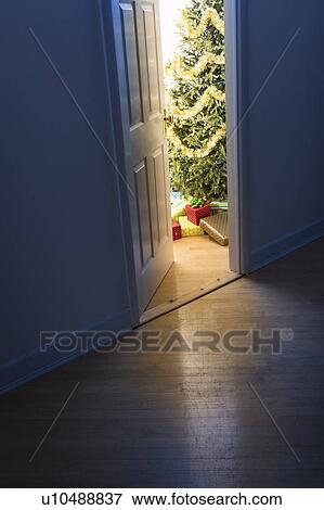 Christmas tree in doorway View Large Photo Image Stock Photo - Christmas tree in doorway. Fotosearch
