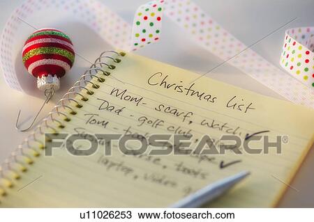 Close-up of christmas gifts list View Large Photo Image Stock Image - Close-up of christmas gifts list. Fotosearch