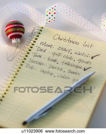 Stock Photograph - Close-up of christmas gifts list. Fotosearch