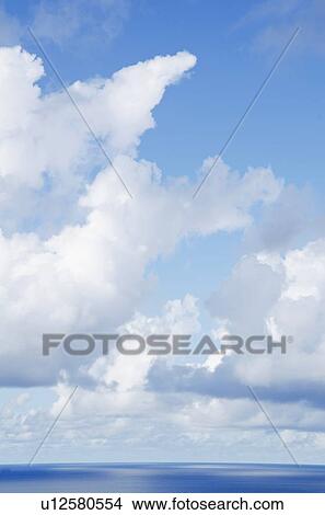 Picture - Clouds over sea. Fotosearch