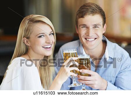 Couple drinking beer View Large Photo Image Stock Image - Couple drinking beer. Fotosearch
