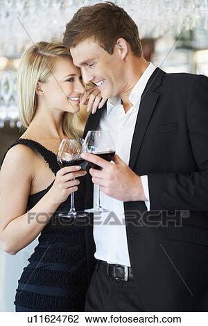 Couple drinking wine in restaurant View Large Photo Image Stock Image - Couple drinking wine in restaurant. Fotosearch