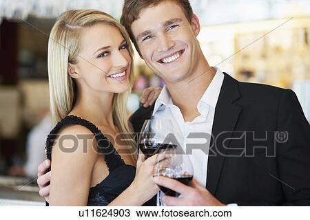 Couple drinking wine in restaurant View Large Photo Image Stock Image - Couple drinking wine in restaurant. Fotosearch