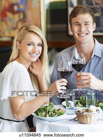 Couple eating lunch in restaurant View Large Photo Image Stock Photography - Couple eating lunch in restaurant. Fotosearch