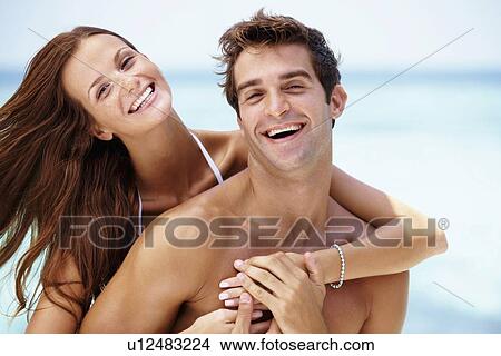 Couple enjoying summer holidays View Large Photo Image Picture - Couple enjoying summer holidays. Fotosearch