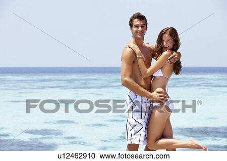 Stock Image - Couple enjoying summer holidays. Fotosearch