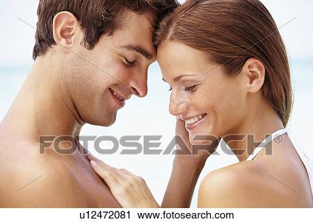 Couple enjoying summer holidays View Large Photo Image Stock Image - Couple enjoying summer holidays. Fotosearch