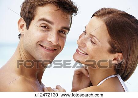 Couple enjoying summer holidays View Large Photo Image Stock Image - Couple enjoying summer holidays. Fotosearch