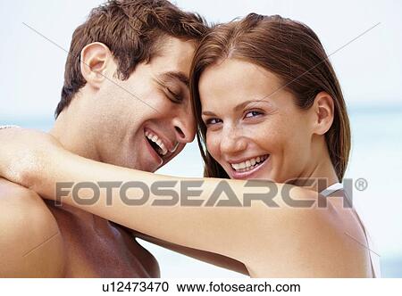 Stock Image - Couple enjoying summer holidays. Fotosearch