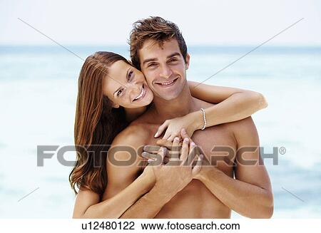 Stock Image - Couple enjoying summer holidays. Fotosearch
