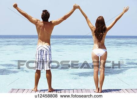 Stock Photo - Couple enjoying summer holidays. Fotosearch