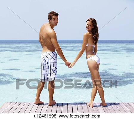Stock Photo - Couple enjoying summer holidays. Fotosearch