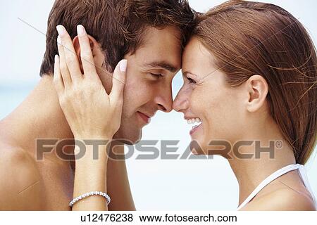 Stock Photo - Couple enjoying summer holidays. Fotosearch