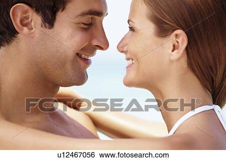 Couple enjoying summer holidays View Large Photo Image Stock Photograph - Couple enjoying summer holidays. Fotosearch