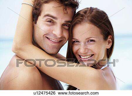 Couple enjoying summer holidays View Large Photo Image Stock Photograph - Couple enjoying summer holidays. Fotosearch