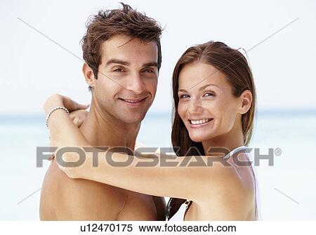Stock Photography - Couple enjoying summer holidays. Fotosearch