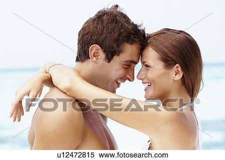 Couple enjoying summer holidays View Large Photo Image Stock Photography - Couple enjoying summer holidays. Fotosearch