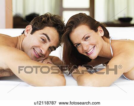 Couple relaxing in spa View Large Photo Image Stock Photo - Couple relaxing in spa. Fotosearch