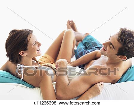 Stock Photo - Couple relaxing. Fotosearch