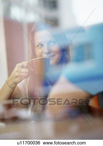 Couple talking in coffee shop View Large Photo Image Stock Photograph - Couple talking in coffee shop. Fotosearch