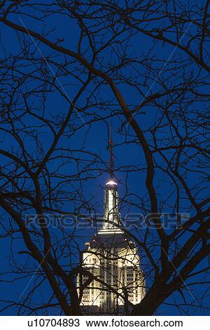 Empire State building illuminated at dusk View Large Photo Image Stock Image - Empire State building illuminated at dusk. Fotosearch
