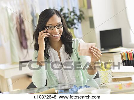 Female entrepreneur in workplace View Large Photo Image Stock Photo - Female entrepreneur in workplace. Fotosearch