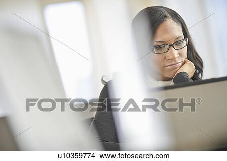 Picture - Female office worker. Fotosearch