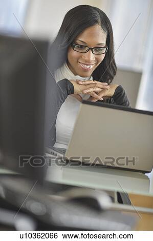 Female office worker View Large Photo Image Stock Photograph - Female office worker. Fotosearch