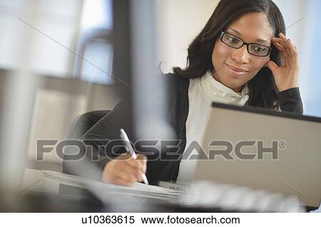 Stock Photography - Female office worker. Fotosearch