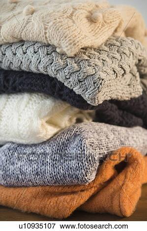 Folded sweaters View Large Photo Image Stock Photo - Folded sweaters. Fotosearch