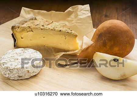 French cheese and bosc pear View Large Photo Image Stock Image - French cheese and bosc pear. Fotosearch