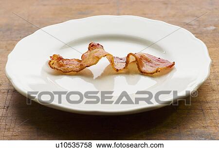 Fried bacon View Large Photo Image Stock Photo - Fried bacon. Fotosearch