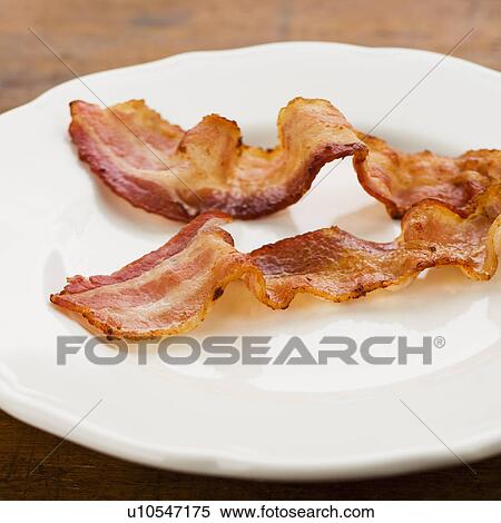 Stock Photography - Fried bacon. Fotosearch