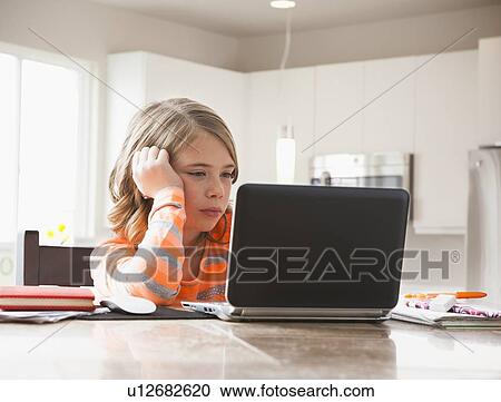 Girl (6-7) doing homework View Large Photo Image Stock Image - Girl (6-7) doing homework. Fotosearch