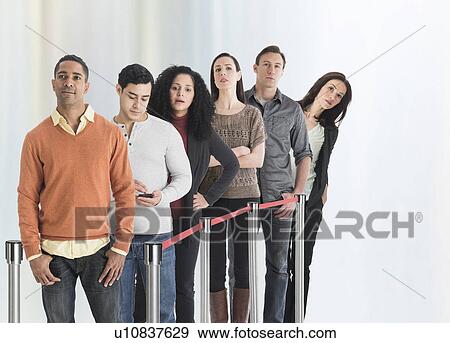 Group of people waiting in line View Large Photo Image Stock Photo - Group of people waiting in line. Fotosearch