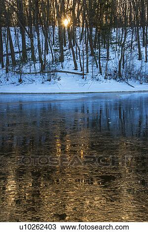 Stock Image - Icy water surface. Fotosearch