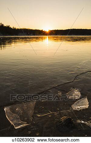 Stock Image - Icy water surface. Fotosearch