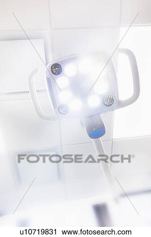 Lamp and ceiling in dentist office View Large Photo Image Stock Image - Lamp and ceiling in dentist office. Fotosearch