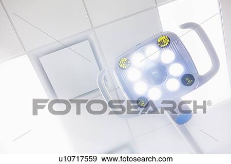 Stock Photo - Lamp and ceiling in dentist office. Fotosearch