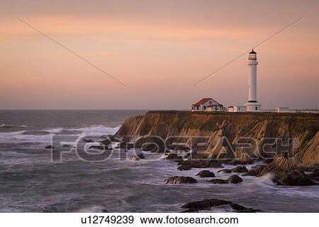 Stock Photo - Lighthouse on cliff. Fotosearch
