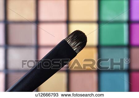Make-up brush against eye shadow palette, studio shot View Large Photo Image Stock Image - Make-up brush against eye shadow palette, studio shot. Fotosearch