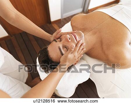 Man getting facial massage in spa View Large Photo Image Stock Photograph - Man getting facial massage in spa. Fotosearch