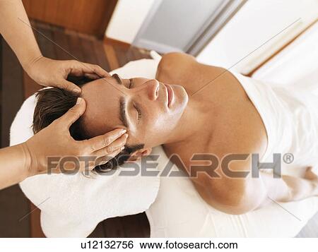 Man getting massage in spa View Large Photo Image Stock Photograph - Man getting massage in spa. Fotosearch