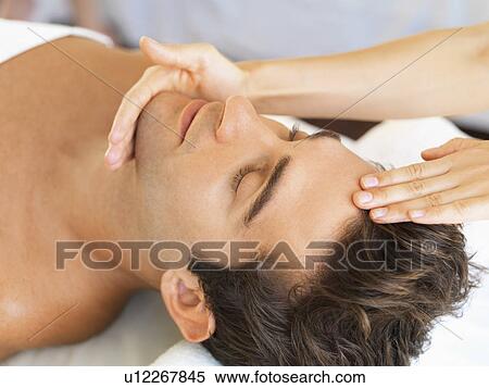 Man receiving massage in spa View Large Photo Image Stock Photography - Man receiving massage in spa. Fotosearch