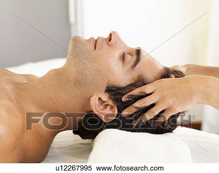 Man receiving massage in spa View Large Photo Image Stock Photography - Man receiving massage in spa. Fotosearch