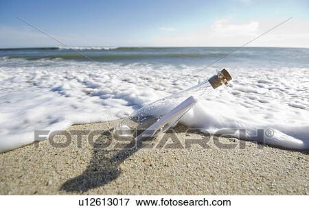 Stock Photo - Message in bottle. Fotosearch