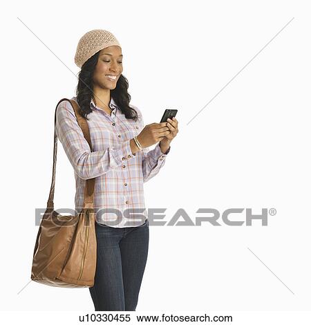 Mid adult woman using phone View Large Photo Image Stock Photography - Mid adult woman using phone. Fotosearch