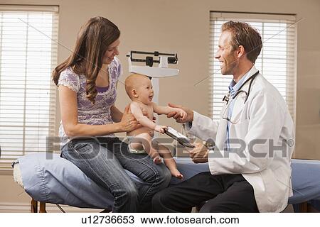 Mother with son (2-5 months) in doctor's office View Large Photo Image Stock Image - Mother with son (2-5 months) in doctor's office. Fotosearch