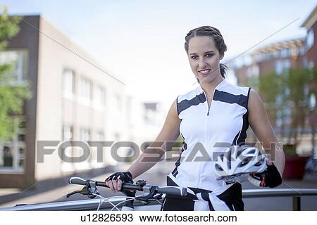 Stock Image - Netherlands, Goirle de Hovel, Portrait of cyclist. Fotosearch