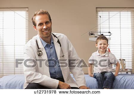 Stock Photo - Pediatrician and boy (2-3). Fotosearch